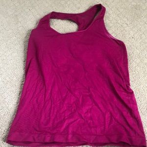 Magenta workout tank with detail and built in bra